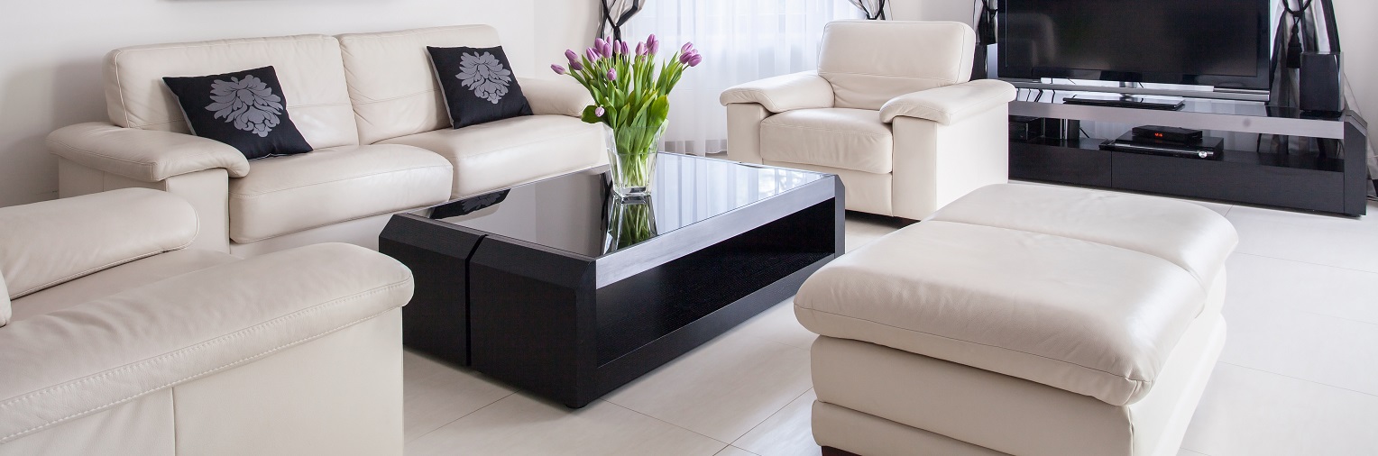 Cream leather lounge suite